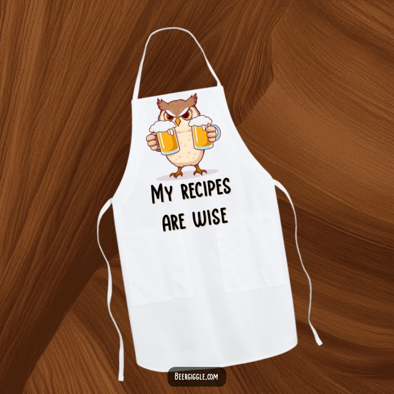 Funny Owl Apron: A determined owl character trying to balance two frothy beer mugs while cooking, a humorous sight.
