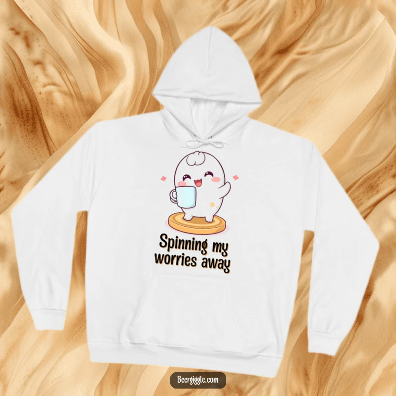 Funny kawaii coaster character spinning happily on a cozy hoodie, radiating warmth and playful energy for a fun, snuggly experience.