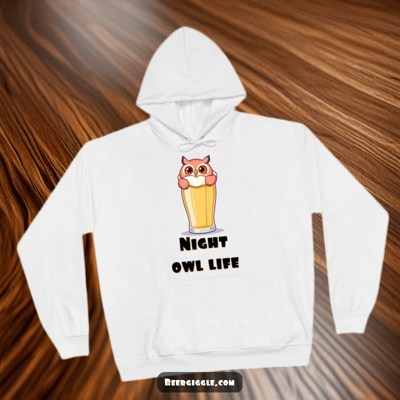 Funny Owl Beer Hoodie: A playful owl peers over a large beer glass, offering hilarious comfort and warmth.
