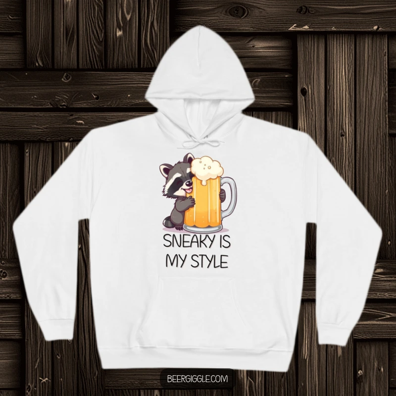Funny raccoon grinning, sneaking a sip of beer, embodying cozy, hilarious mischief in this comfortable hoodie.