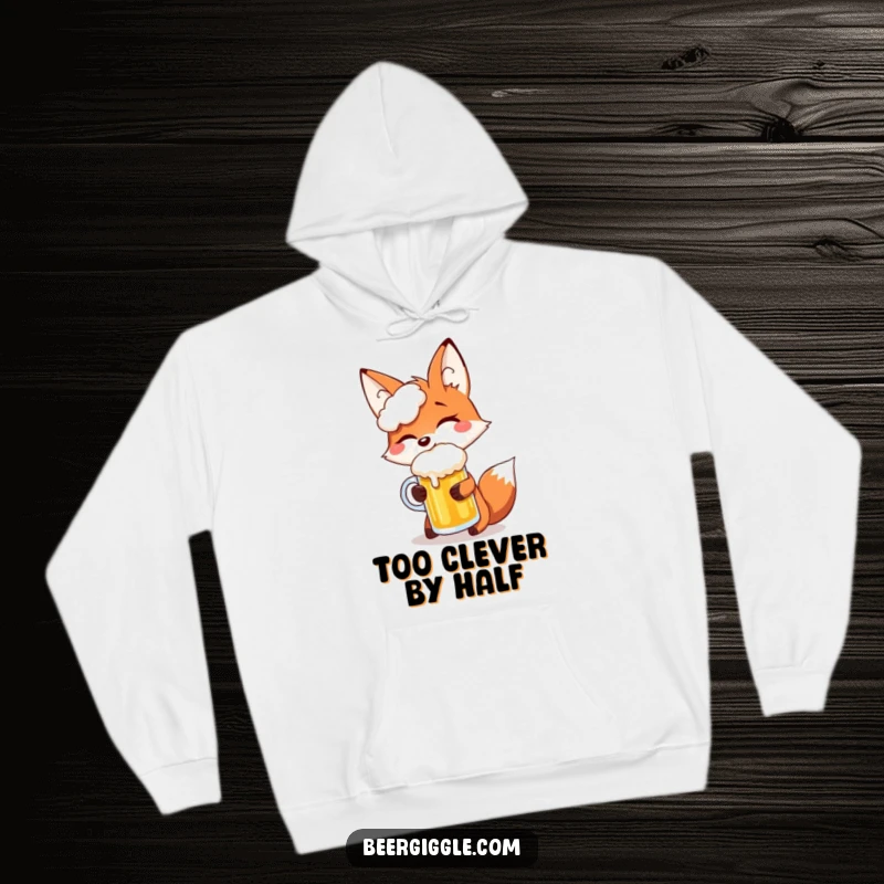 Funny fox giggling, balancing a beer mug on its snout, embodying playful, hilarious comfort in this cozy hoodie.
