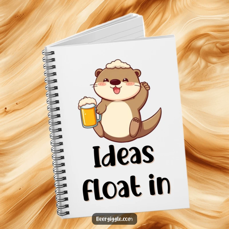 Funny Notebook with a cheerful otter floating on its back with a beer mug, ideal for writing down creative thoughts.